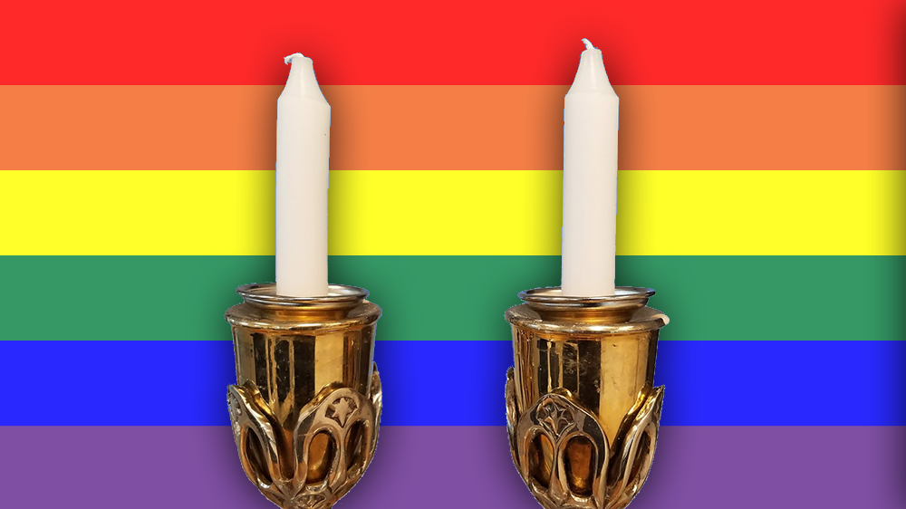 Shabbat candles with Rainbow flag